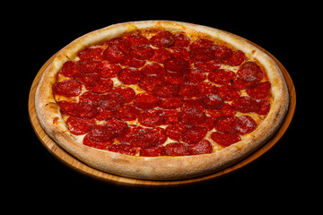 Top view pizza on table top, Flat lay of pizza on black background, Prepared pizza on table for serve
Freshly baked homemade pizza isolated on a black background. View from above