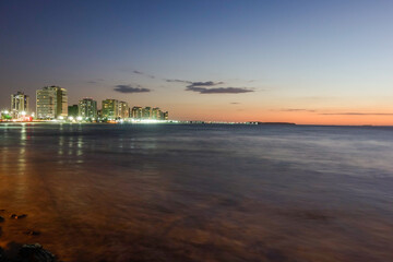 coast city of Sao Luis, Maranhao, Brazil. wonderful sunset with colors reflecting in the sky