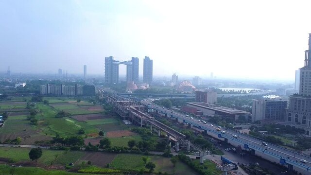 KOLKATA, INDIA :-Bird eye view of kolkata city with ITC hotel,atmosphere building and maa fly over at New Town on the main arterial road. Concept of drone shot,land,flyover,roads,buildings.