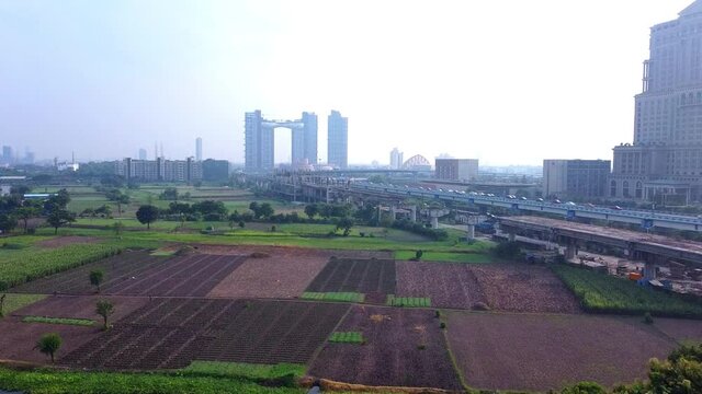 KOLKATA, INDIA :-Bird eye view of kolkata city with ITC hotel,atmosphere building and maa fly over at New Town on the main arterial road. 4k,aerial,drone,kolkata city,conceptual shot.