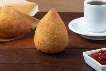Coxinha stuffed with chicken and coffee