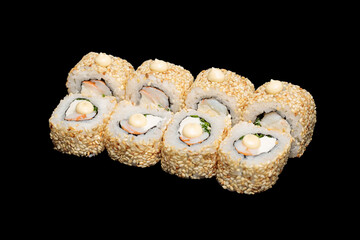 Japanese food: maki and nigiri sushi set on black background. side view composition.