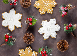 Delicious homemade gingerbread. Gingerbread cookies on a rusty wooden background. View from above. Christmas. Copy space