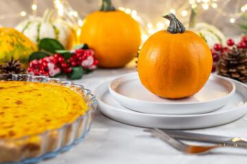 Pumpkin pie and pumpkin. Traditional Dinner Thanksgiving. Fresh pumpkin pie.