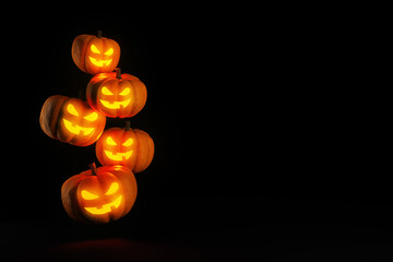 Flying Halloween pumpkin heads with glowing faces on dark, 3d rendering, copy space. Holiday background with Halloween Jack o Lanterns.