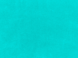 turquoise velvet fabric texture used as background. Empty turquoise fabric background of soft and smooth textile material. There is space for text.