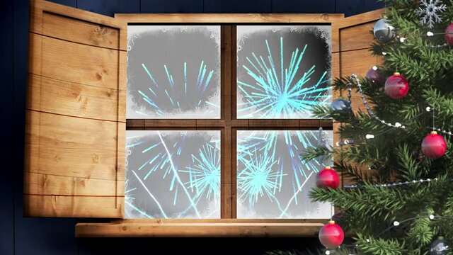 Christmas tree and wooden window frame against fireworks exploding on black background