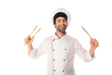 Smiling chef holding wooden tweezers isolated on white