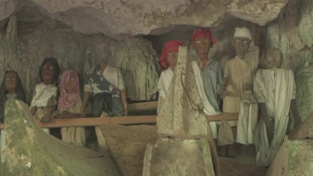 Tampang Allo, Tana Toraja, Indonesia - Tau Tau Human Skulls Piles of Bones Burial Graves Cave