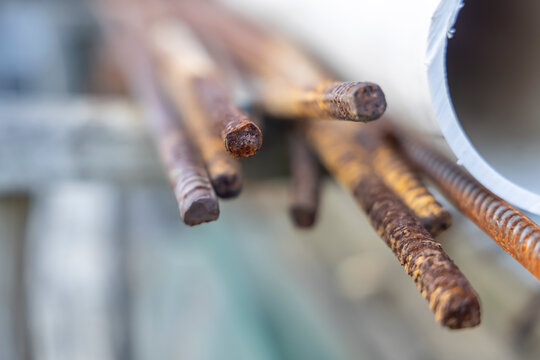 Close up shot of ends of rusted metallic rods