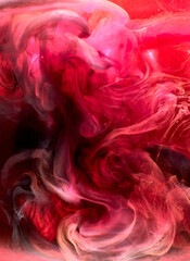 Red black pigment swirling ink abstract background, liquid smoke paint underwater