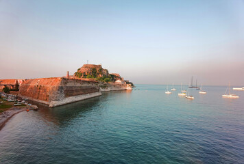 Fototapeta premium corflu island castle, liight and church of st george by the sea , greece