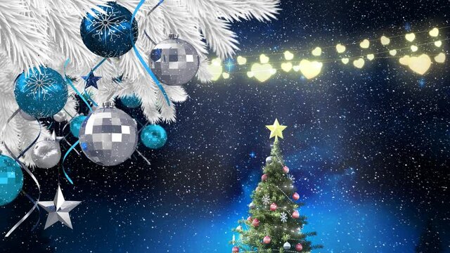 Animation of fairy lights, christmas tree decoration, snow falling over blue sky