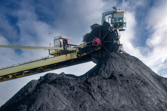 Huge mountains of coal are necessary to keep the kilns burning at Tata Steel. Wijk aan Zee, Noord-Holland province, The Netherlands