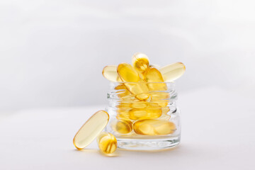 yellow pills omega 3 capsules fish oil for health - obrazy, fototapety, plakaty