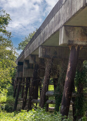pillars under an elevated railroad bridge