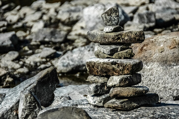 Inukshuk guards the shores of the ocean.