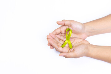 two hands holding green ribbon cane, cancer lymphoma, white background