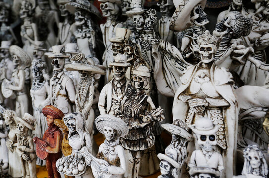 Skulls, some representing Our Lady of the Holy Death or Santa Muerte, a Mexican deity, are seen for sell in a street stall of Chapultepec public park, Mexico City, Mexico.