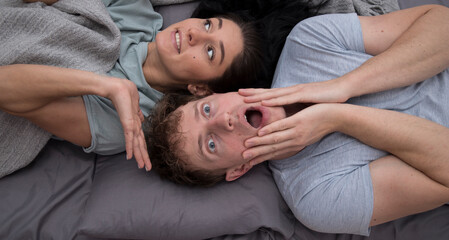 Portrait of happy girl hugging her boyfriend. Funny face. Couple in love. Sensual. Sexy photo. Fun....