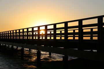 sunset over the pier