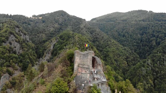 Vlad Tepes Dracula Poenari castle on top of the hill 4K drone shot