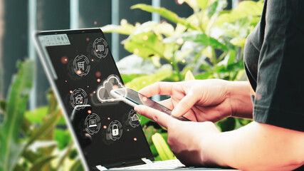 woman use mobile, smart phone and laptop, cloud computing diagram and social icons show on virtual...