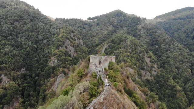 Vlad Tepes Dracula Poenari castle on top of the hill 4K drone shot