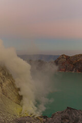 Fototapeta na wymiar Ijen volcano with crater lake Kawah Ijen with active solfataras, sulfur volcano | Java Island, Indonesia