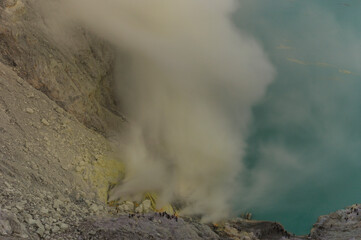 Ijen volcano with crater lake Kawah Ijen with active solfataras, sulfur volcano | Java Island, Indonesia
