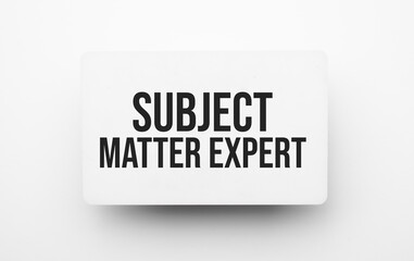 SUBJECT MATTER EXPERT sign on notepad on the white backgound