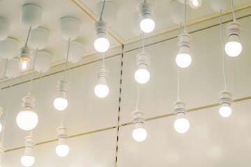 Rows of hanged led glowing light bulbs