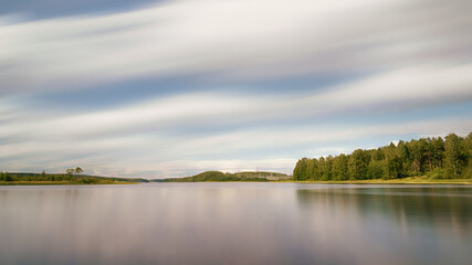 Vuoksi river, forest and power lines long exposure landscape