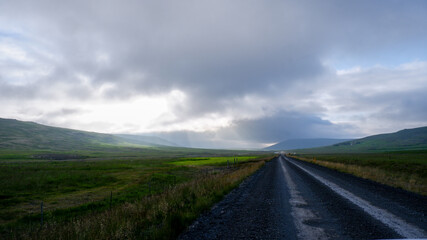 Driving through the Western Region of Iceland in the midnight sun