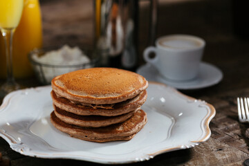 Fototapeta na wymiar Fresh pancakes with berries brunch