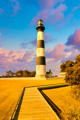 A colorful psychedelic landscape of Bodie Island Lighthouse in pop art colors.