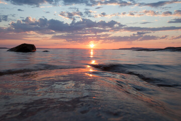 Pink sunset over golden wave scandinavia