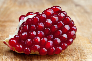 fresh pomegranate seeds on the kitchen table