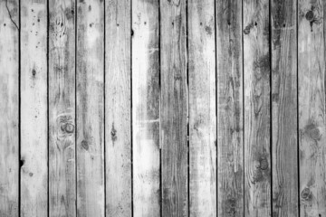 Wooden texture background. Black and white beautiful old wooden wall or fence close up. Grey backdrop for design. Vertical wooden boards. Close up, copy space