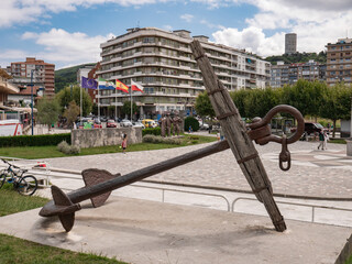 Large anchor located in the fishermen's park with the sculpture of the three fishermen made with wrought iron