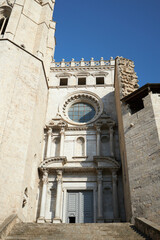 Girona Cathedral, also known as the Cathedral of Saint Mary of Girona, aerial view of Girona city in summer day with blue sky, Girona landmarks, Catalonia, Spain