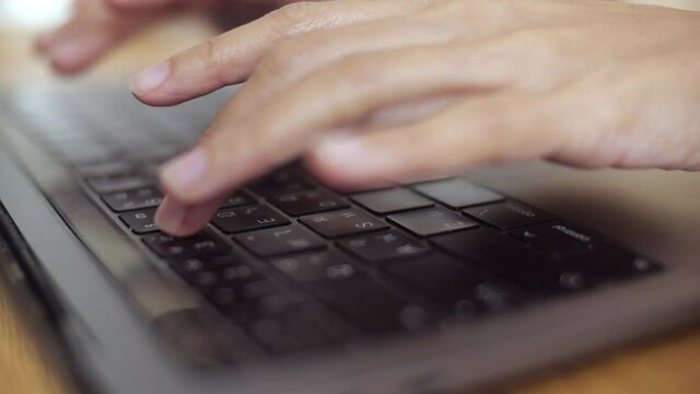 Blogger woman typing on computer keyboard, laptop, green screen