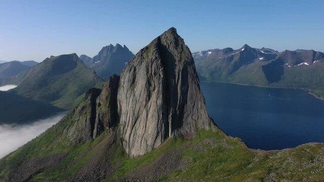 Segla the most iconic peak of Norwegian Senja island, the most beautiful cliffed mountain above the arctic fjord. Located in Northern of Norway.