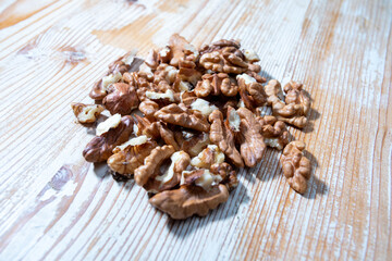 walnut halves on wooden background