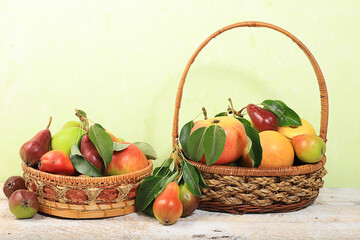 Apples and pears on a rustic table. Diet and weight loss concept, jewish new year Rosh Hashanah background. Harvesting in autumn in the village, ecological food. Healthy eating,