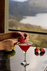 cocktail with red strawberry
