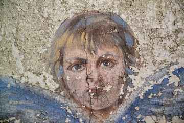 Fototapeta na wymiar wall painting inside an abandoned Orthodox church