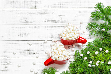Hot drink with marshmallow. Christmas holidays food flat lay