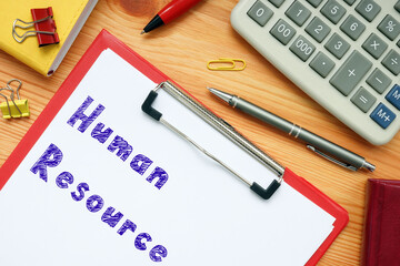  Human Resource inscription on the piece of paper.
