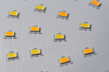 Printed circuit boards for lighting fixtures, surface-mount LEDs